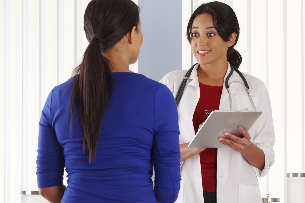 doctor talking to patient