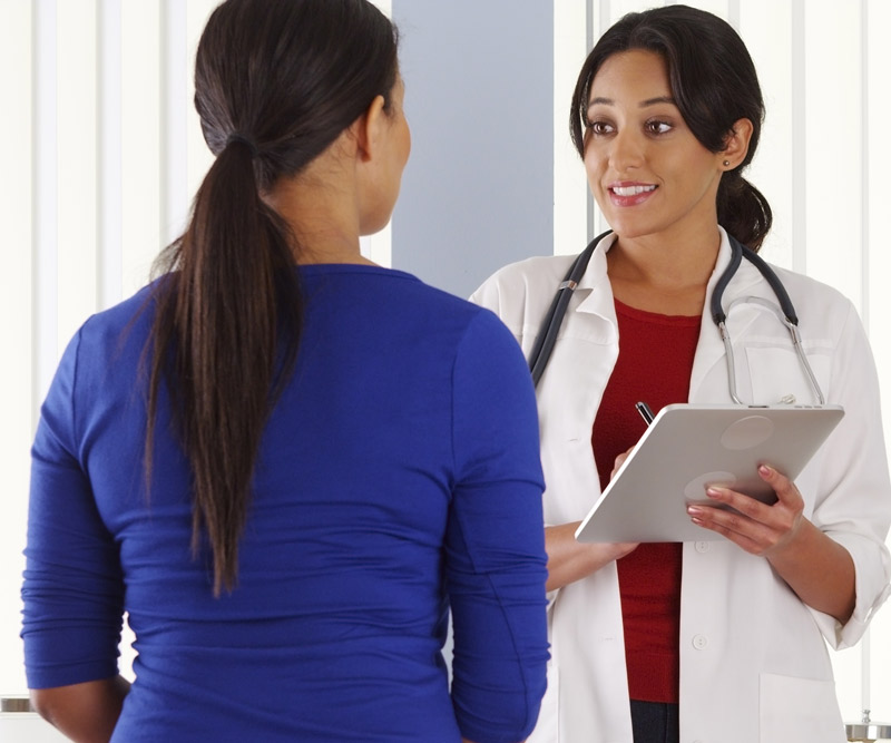 doctor talking to patient