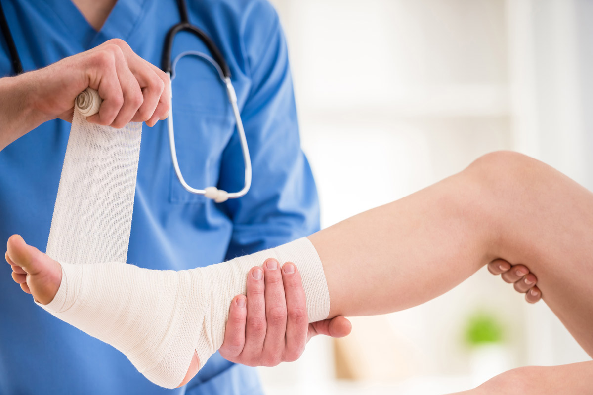 foot getting wrapped by doctor