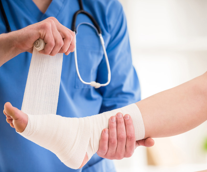 foot getting wrapped by doctor