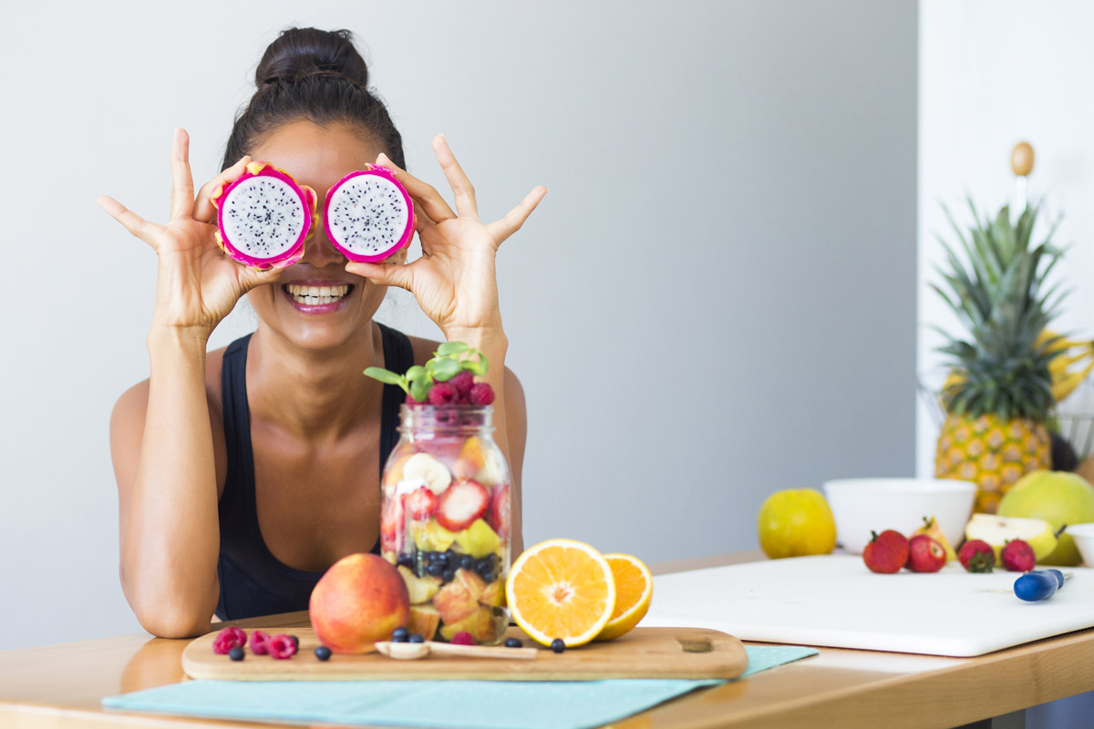 woman playing with her healthy food