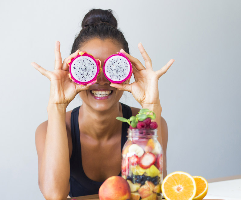 woman playing with her healthy food