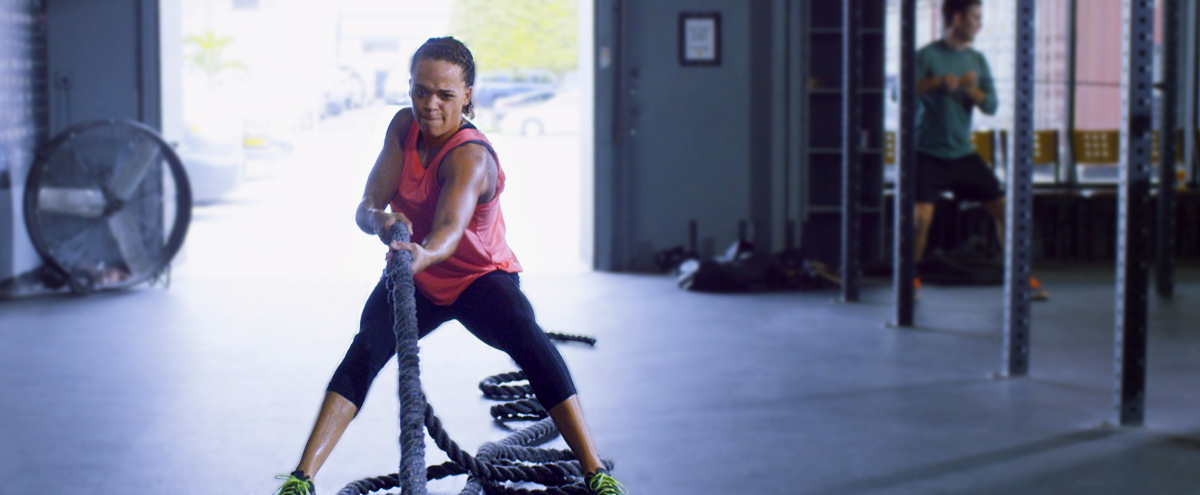 Woman working out pulling rope