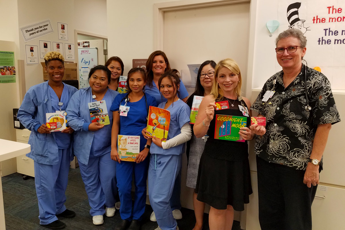 Group of physicians promoting book reading