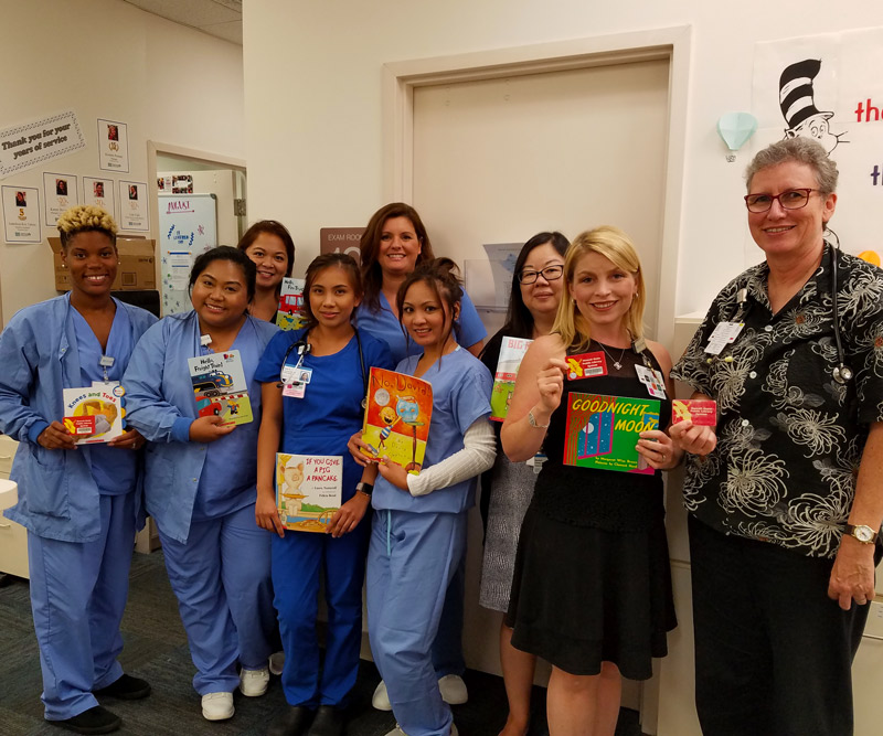 Group of physicians promoting book reading