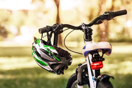 Bicycling is one of the top activities during which children are most likely to suffer a concussion. The best way to reduce your keiki's risk? Make sure they always wear a helmet.
