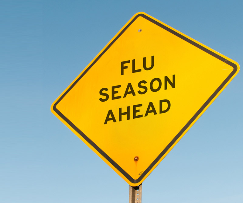 road sign reading: "Flu season ahead"