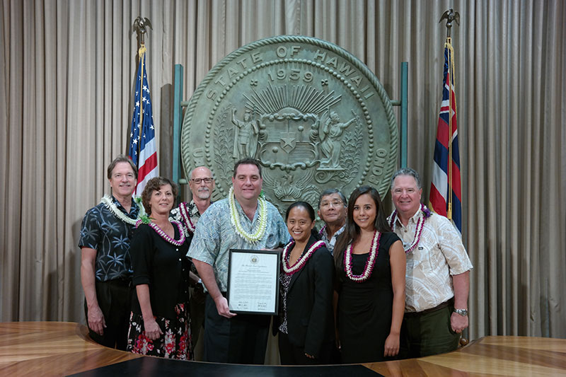 Hawaii Pacific Health team holding award