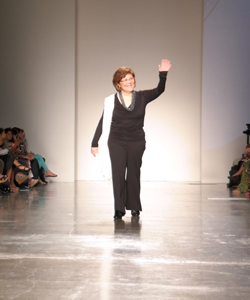 Anne Yoshioka walks the runway in the 2015 Hawaii Pacific Health 'Beautiful Survivors' fashion show, held during Honolulu Fashion Week.