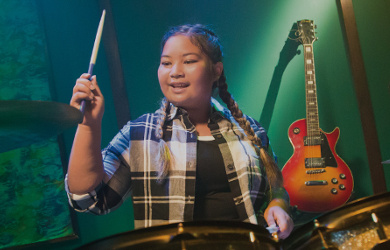 girl playing the drums
