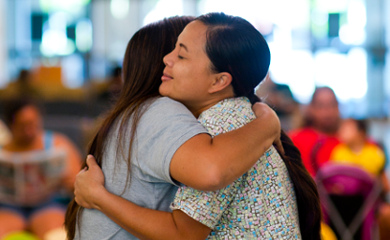 two girls embracing