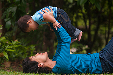 Marol Kawada playing with his son