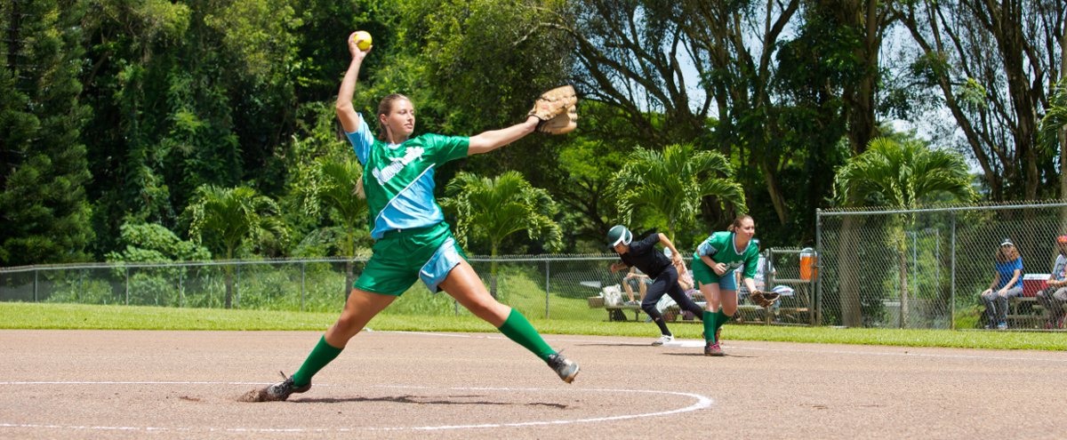 girl pitching a softball