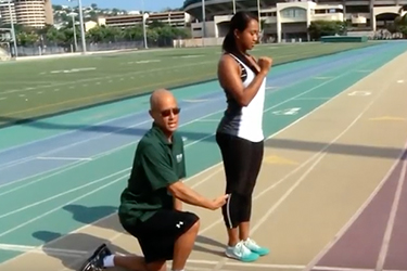 Two people on a track