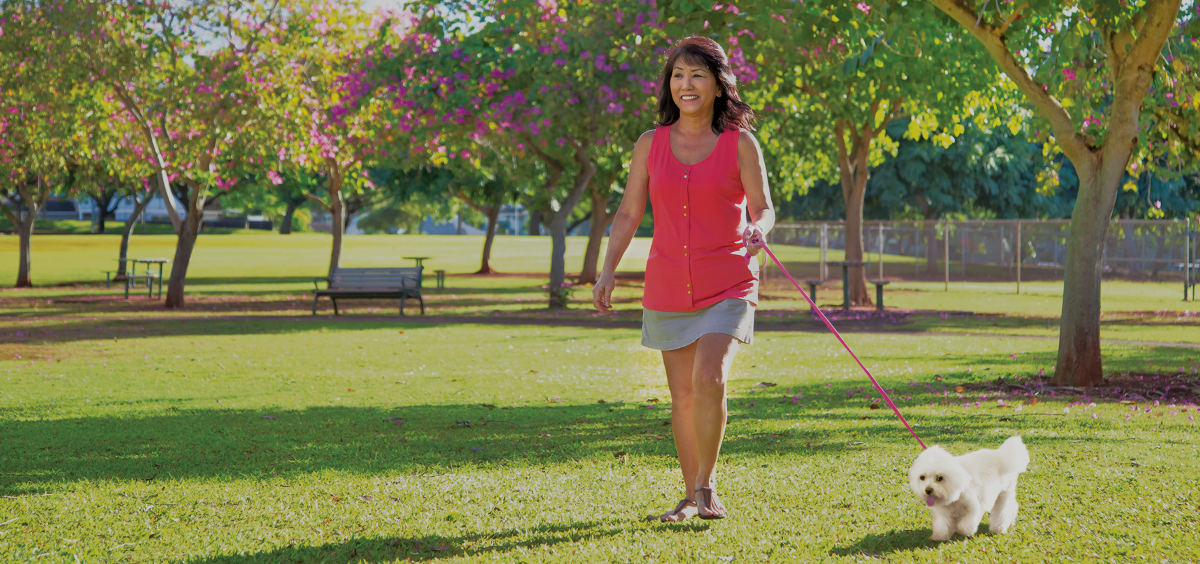 Woman walking her dog