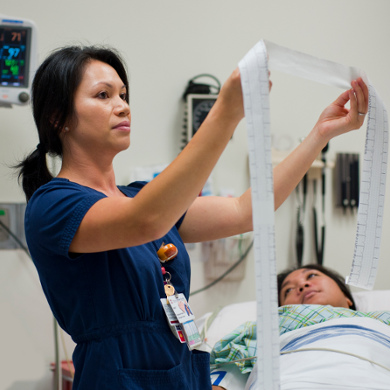 Doctor analyzing a EKG report