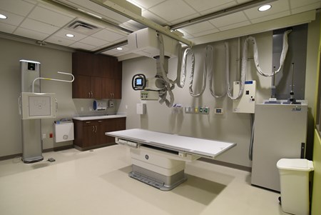 An on-site satellite radiology suite includes a general X-ray machine, which eliminates the need to transport patients to a separate department.
