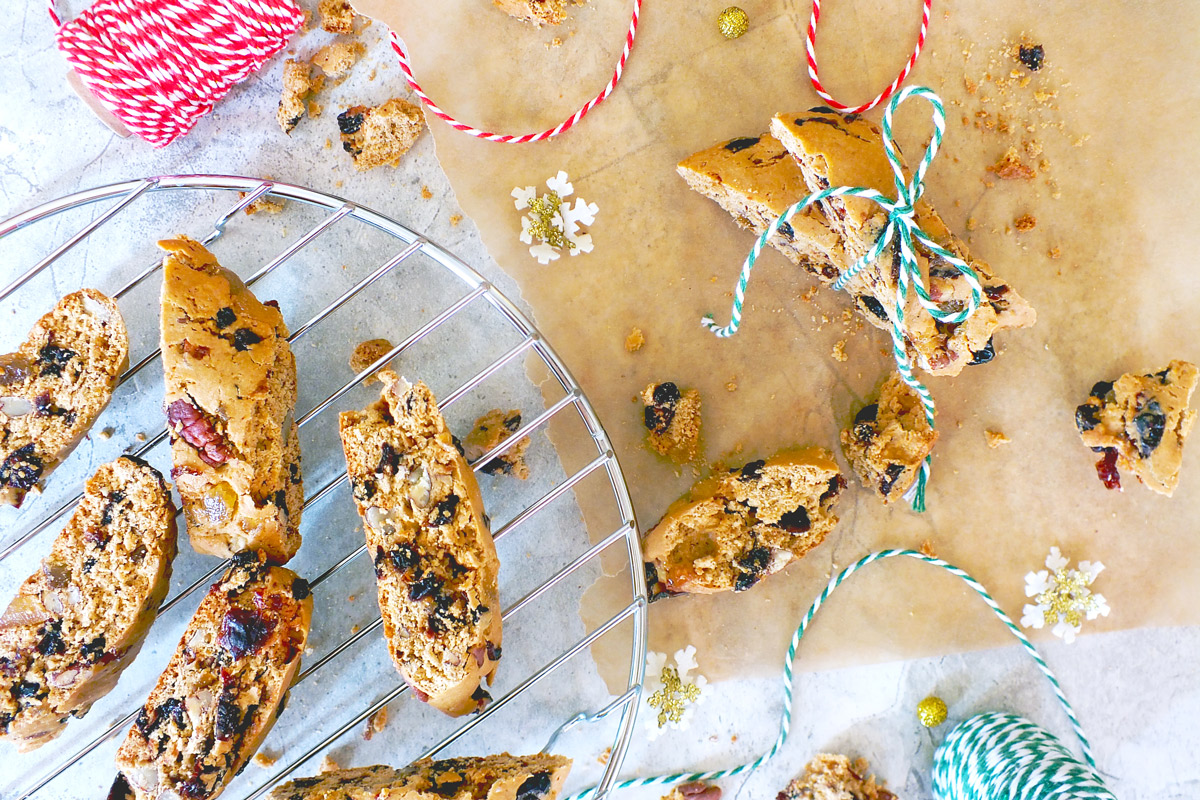Fruitcake biscotti on a table decorated for the holidays