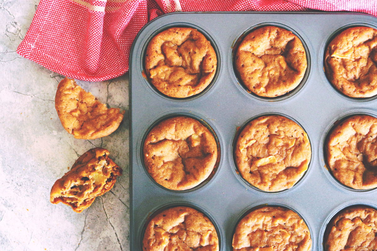 A baking pan of freshly baked Apple Spice Muffins