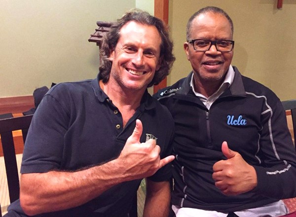 Dr. David Rovinksy (left) flashes a shaka with Dr. Erik Zeegen.