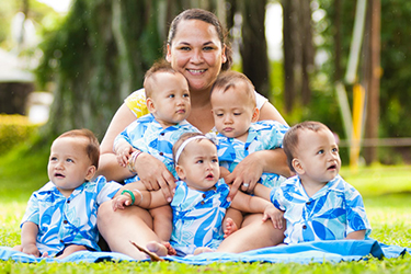 Marcie Dela Cruz with babies Kapena, Kupono, Keahi, Kaolu, Keahi and Kamalii