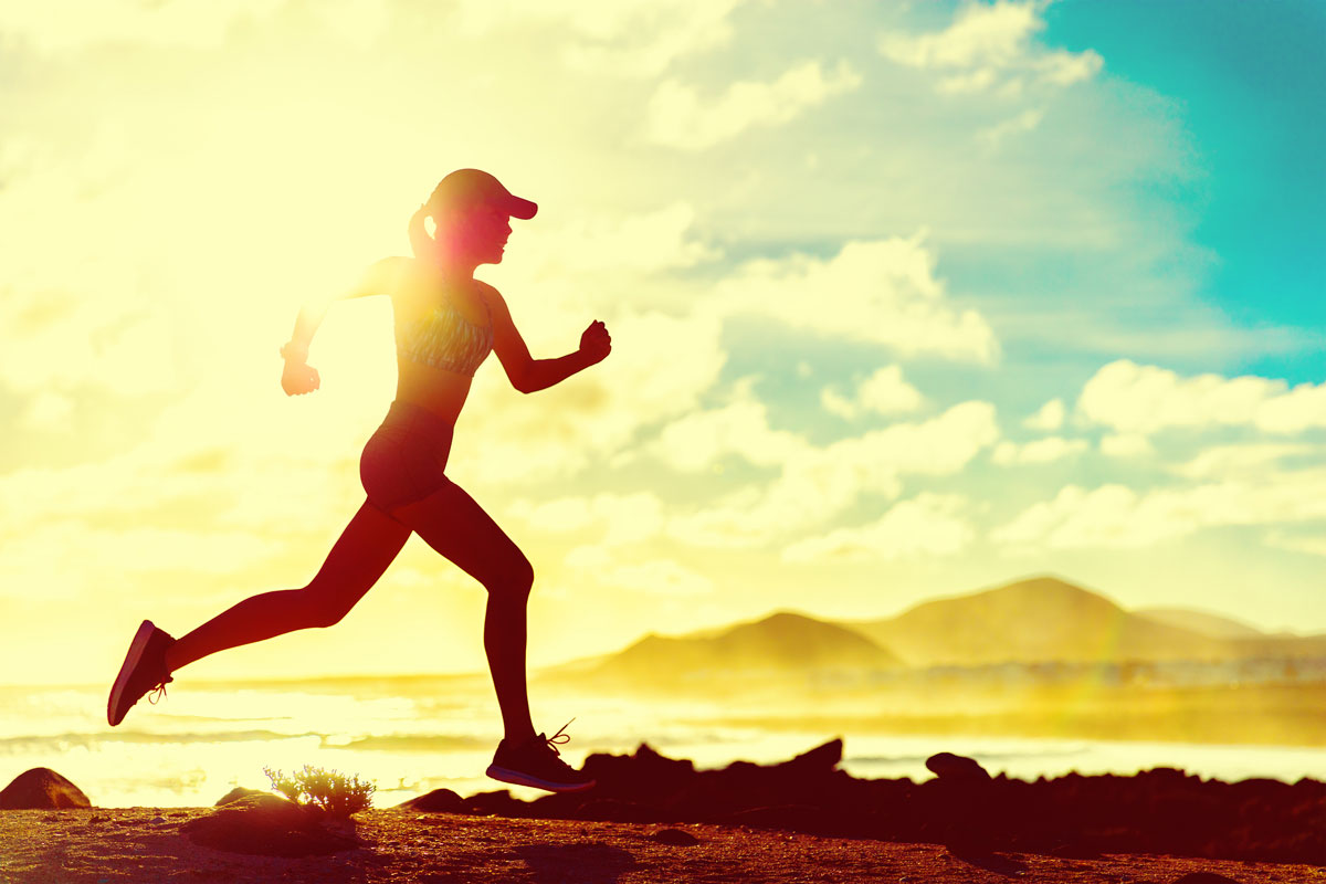 woman running by the beach