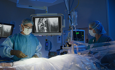 Bone & Joint Team Performing Surgical Operation in Modern Operating Room