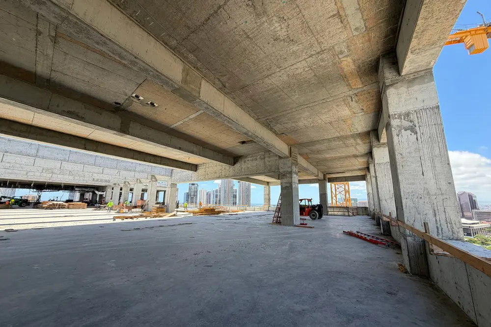 Concrete columns and beams frame views of Honolulu from Level 20.