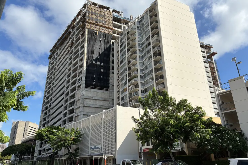 Street-level view of the parking building beside the existing medical center.