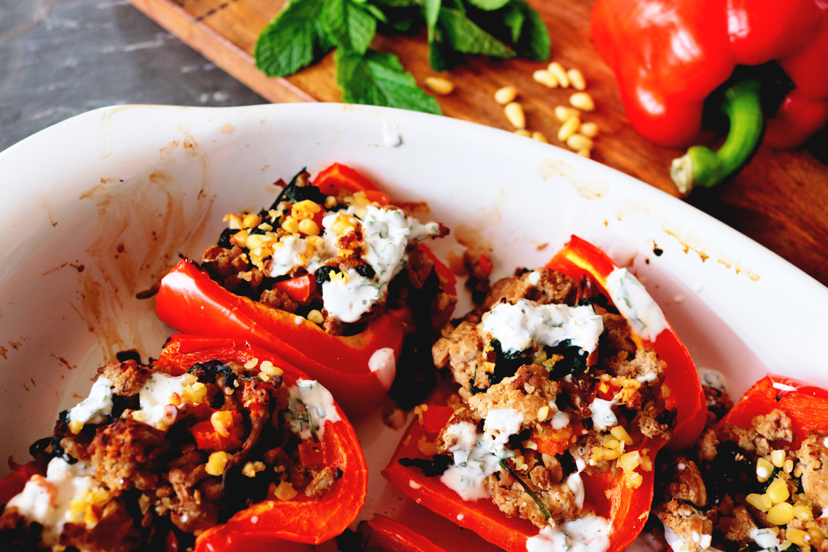 Masala Stuffed Peppers in a ceramic baking dish fresh out of the oven.