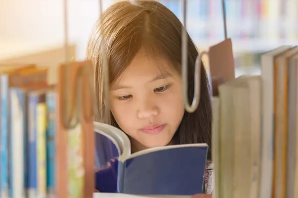 A child reading a book.