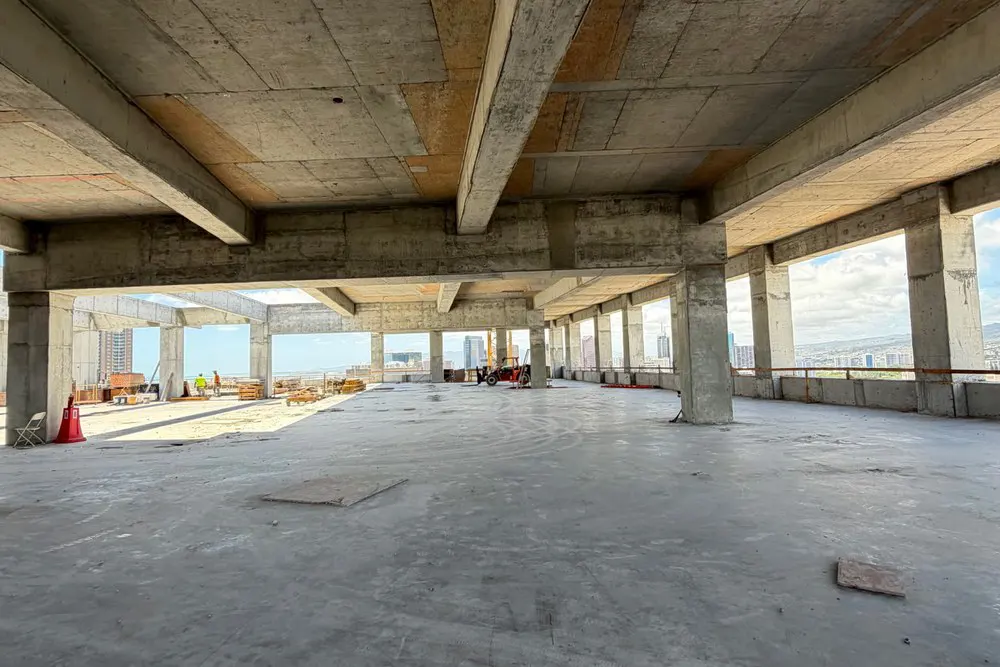 Open concrete floor and ceiling beams on the mauka side of Level 20.