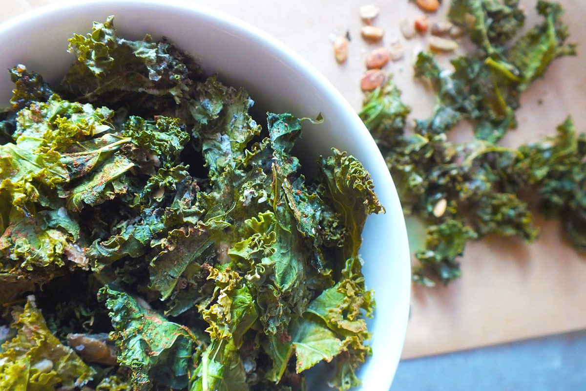 Crispy greens in a white bowl. 